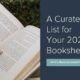 A hand holding an open book on the left page, next to the text: "A Curated List for Your 2025 Bookshelf.”